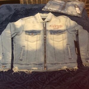Rockstar Women's Distressed Light Blue Jean Jacket S-M